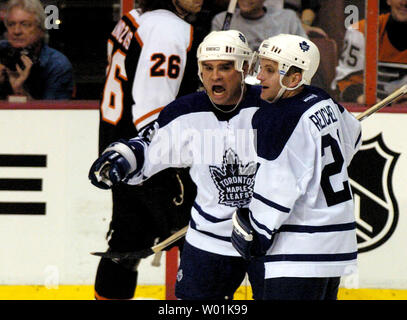 Toronto Maple Leafs' Tie Domi and Chad Kilger celebrate after Domi's shot  beats Boston Bruins goalie Andrew Raycroft for the Leafs first goal in the  first period at the Air Canada Center