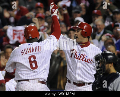 Former Philadelphia Phillies all-star Ryan Howard hugs his
