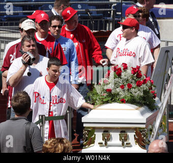 Thousands of fans who came to Citizens Bank Park April 18, 2009 to pay their respects to longtime Hall of Famer Philadelphia Phillies announcer Harry Kalas pass by his casket.  Kalas,  a Philadelphia Phillies announcer for the past 30 years, died earlier this week at a game.  He is only the second baseball person to lie in state in a professional baseball stadium since Babe Ruth in 1948.   (UPI Photo/John Anderson) Stock Photo