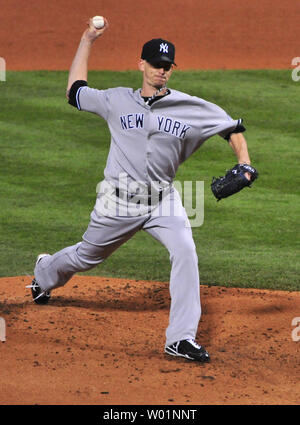 New York Yankees pitcher A. J. Burnett reacts during the first inning ...