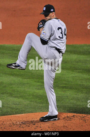 New York Yankees pitcher A. J. Burnett reacts during the first inning ...