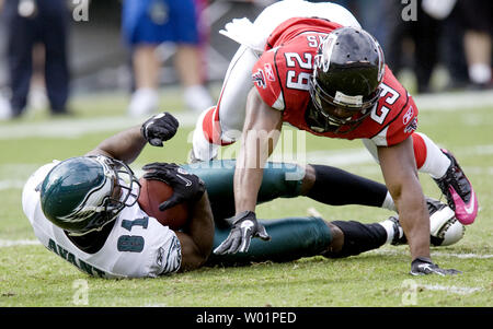 Atlanta Falcons corner back Brian Williams (29) dives over Philadelphia Eagles wide receiver Jason Avont (81) who is already down on the Atlanta 14-yard line during second quarter Philadelphia Eagles-Atlanta Falcons game action in Philadelphia at Lincoln Financial Field October 17, 2010.  Philadelphia defeated Atlanta 31-17 .              UPI/Eileen Angelino Stock Photo