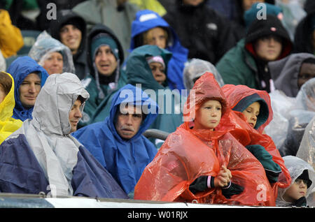 Eagles fans don rain gear as Hurrican Sandy moves into the regain during  the game against the Atlanta Falcons in NFL action at Lincoln Financial  Field in Philadelphia on October 28, 2012.