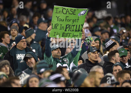 Philadelphia Eagles fans celebrate in the stands during the fourth