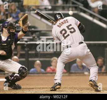 Arizona Diamondbacks starting pitcher Randy Johnson walks back to the  dugout after the third out of the third inning against the Los Angeles  Dodgers July 15, 2004 in Phoenix, AZ. (UPI Photo/Will