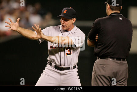 Detroit Tigers manager Alan Trammell, right, talks with bench coach Kirk  Gibson during opening day at Comerica Park in Detroit against the Minnesota  Twins Monday, March 31, 2003. The Tigers lost to