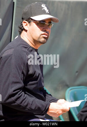 Chicago White Sox manager Will Venable, left, watches players during