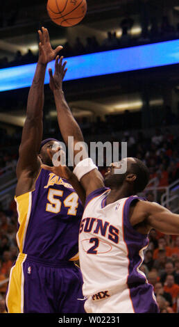 Los Angeles Lakers Kwame Brown shoots a jumper over  Phoenix Suns Tim Thomas in the first quarter of the first game of the NBA playoffs  in Phoenix, AZ April 23, 2006.     (UPI Photo/Will Powers) Stock Photo