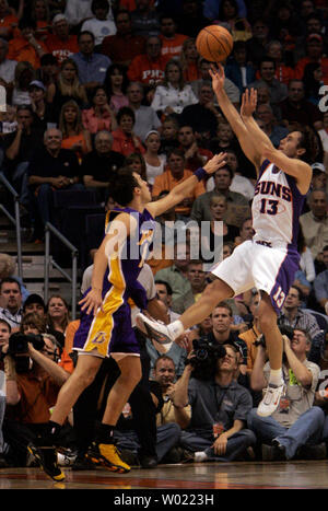 Phoenix Suns Steve Nash shoots a long jumper of the Los Angeles Lakers Sasha Vujacic in the first quarter of the second game of the NBA play offs in Phoenix, AZ April 26, 2006.       (UPI Photo/Will Powers) Stock Photo