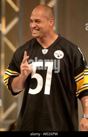 Pittsburgh Steelers quarterback Ben Roethlisberger autographs the shirt off  his back during the Steeler Style 2007 Fashion Show benefitting the Thomas  E Starzl Transplant Institute and the Cancer Caring Center on October