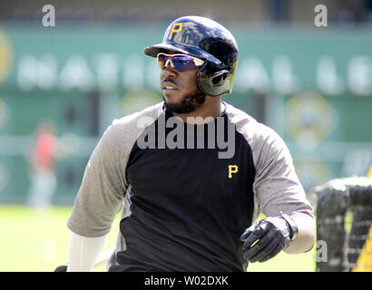 Pittsburgh Pirates second baseman Josh Harrison (5) throws to first base  during a baseball game against the Milwaukee Brewers in Pittsburgh,  Tuesday, July 19, 2016. (AP Photo/Fred Vuich Stock Photo - Alamy