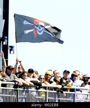 Pittsburgh Pirates fans wave the Jolly Roger flag on the rotunda as the  standing room only crowd at PNC Park watches the ten inning opening day 1-0  win over the Chicago Cubs
