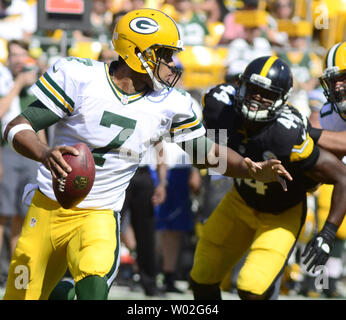 Green Bay Packers quarterback Brett Hundley (7) scrambles away from Pittsburgh Steelers linebacker Howard Jones (44) in the third quarter of the Steelers 24-19 preseason win at Heinz Field in Pittsburgh on August 23, 2015.  Photo by Archie Carpenter/UPI Stock Photo