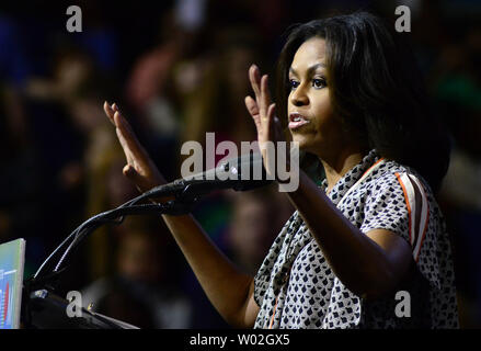 First Lady Michelle Obama addresses the crowd of young people and the families  before at a special event promoting her 'Reach Higher' program  along with the LeBron James Family Foundnation at the James A. Rhodes Arena, at the University of Akron in Akron Ohio.  Photo by Archie Carpenter/UPI Stock Photo