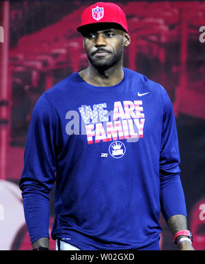 LeBron James addresses the crowd of young people and the families  before introducing First Lady Michelle Obama at a special event promoting her 'Reach Higher' program  along with the LeBron James Family Foundnation at the James A. Rhodes Arena, at the University of Akron in Akron Ohio.  Photo by Archie Carpenter/UPI Stock Photo