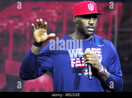LeBron James addresses the crowd of young people and the families  before introducing First Lady Michelle Obama at a special event promoting her 'Reach Higher' program  along with the LeBron James Family Foundnation at the James A. Rhodes Arena, at the University of Akron in Akron Ohio.  Photo by Archie Carpenter/UPI Stock Photo