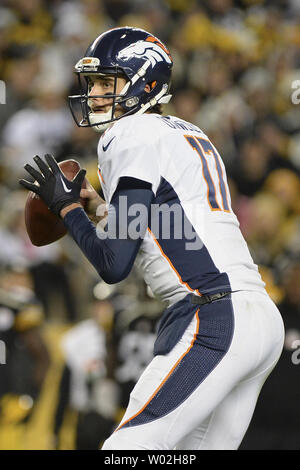 Denver Broncos quarterback Brock Osweiler (17) throws a pass during the ...