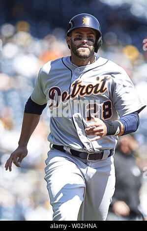 Detroit Tigers' Nick Castellanos, right, celebrates with Jeimer ...