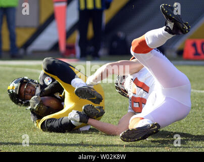 Pittsburgh Steelers inside linebacker Ryan Shazier (50) stops Miami Dolphins  wide receiver Jarvis Landry (14) late in the fourth quarter of the Pittsburgh  Steelers 30-12 win at the AFC Wild Card Playoff