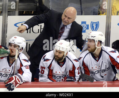 Washington Capitals head coach Barry Trotz points to the ice as he leans in to talk with Washington Capitals center Lars Eller (20) late in the third period of the Pittsburgh Penguins 3-2 win in game four of the second round of the Stanley Cup Playoffs at PPG Paints Arena  in Pittsburgh on May 3, 2017.  The win gives the Pittsburgh Penguins a 3-1 lead in the series against the Washington Capitals.  Photo by Archie Carpenter/UPI Stock Photo