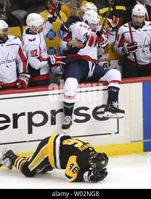 https://l450v.alamy.com/450v/w02ng8/pittsburgh-penguins-center-zach-aston-reese-46-attempts-to-rise-from-the-ice-after-colliding-with-washington-capitals-right-wing-tom-wilson-43-during-the-second-period-of-the-capitals-4-3-win-in-game-three-during-the-second-round-of-the-eastern-conference-2018-nhl-stanley-cup-playoffs-at-ppg-paints-arena-in-pittsburgh-on-may-1-2018-photo-by-archie-carpenterupi-w02ng8.jpg