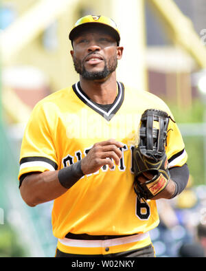 Milwaukee, USA. August 24, 2018: Pittsburgh Pirates center fielder Starling  Marte #6 along with the Brewer infielders watch the review challenge on the  jumbo screen of Martes stolen base in the 11th