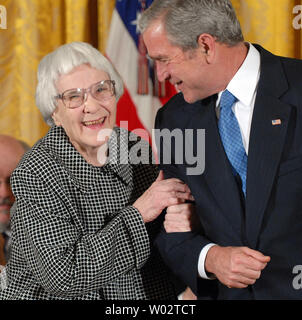 U.S. President George W. Bush awards the Presidential Medal of Freedom to Harper Lee, author of 'To Kill a Mockingbird,' in the East Room of the White House in Washington on November 5, 2007.   (UPI Photo/Roger L. Wollenberg) Stock Photo