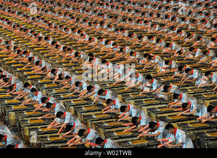 The pageantry of the Olympics is shown with thousands of drummers tapping out a lit signal during a dress rehearsal of the Opening Ceremony of the 2008 Summer Olympics at the National Stadium, called the Bird's Nest, in Beijing on August 5, 2008.  The Summer Games begin with the Opening Ceremony on August 8, 2008, and will run through August 24, 2008.   (UPI Photo/Pat Benic) Stock Photo