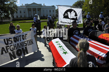 Demonstrators calling for the end of torture, detentions in Guantanamo Bay and the war in Afghanistan and Iraq gather in front of the White House in Washington on October 5, 2009.  UPI/Kevin Dietsch Stock Photo