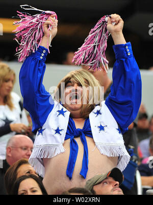 A Dallas Cowboys' fan dressed as a cheerleader for Halloween