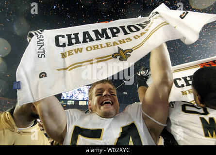 New Orleans Saints line backer Troy Evans (54) holds up a Champion towel  after the Saints defeated the Indianapolis Colts 31-17 in Super Bowl XLIV  at Sun Life Stadium in Miami on February 7, 2010. UPI/John Angelillo Stock  Photo - Alamy