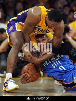 Los Angeles Lakers small forward Metta World Peace (15) and Oklahoma City Thunder point guard Russell Westbrook (0) battle for the ball during game 3 of the Western Conference Semifinals at Staples Center in Los Angeles on May 18, 2012. UPI/Lori Shepler Stock Photo