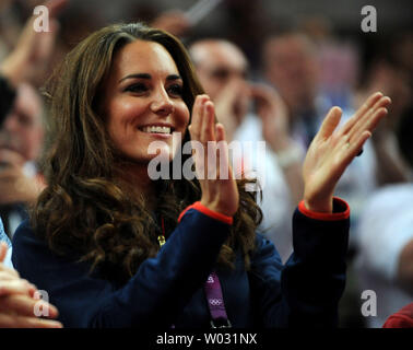 Kate Middleton, the Duchess of Cambridge, cheers on Great Britain's entries in the Men's Pommel Horse Apparatus Finals at the North Greenwich Arena  during the London 2012 Summer Olympics in Greenwich, London on August 5, 2012.   UPI/Pat Benic Stock Photo