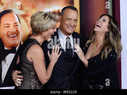Cast members Emma Thompson (L) and Tom Hanks and Hanks' wife, actress Rita Wilson attend the premiere of the biographical motion picture drama 'Saving Mr. Banks' , the untold backstory of how the classic film 'Mary Poppins' made it to the screen, at Walt Disney Studios in Burbank, California on December 9, 2013. UPI/Jim Ruymen Stock Photo