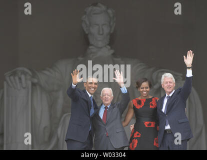 President Barack Obama, former President Jimmy Carter, First Lady Michelle Obama and form President Bill Clinton wave as they leave the 50th Anniversary of the March on Washington at the Lincoln Memorial in Washington, D.C. on August 28, 2013.  Thousands gathered at the Memorial to celebrate the anniversary of Martin Luther King Jr.'s 'I Have a Dream' speech.  UPI/Kevin Dietsch Stock Photo