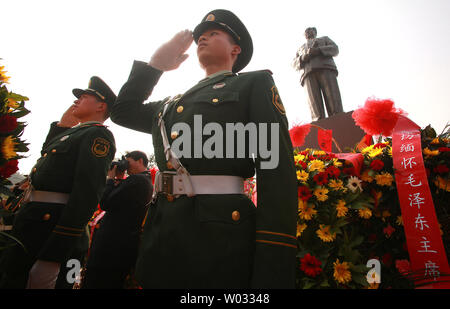 Troops participate in a military wreath laying ceremony for former chairman Mao Zedong in his home town of Changsha, the capital of Hunan Province in China on October 28, 2013.  More than $2.5 billion is being poured into the hometown of China's founding father Mao Zedong to mark the 120th anniversary of his birth, local media reported. The amount of money being spent to celebrate Mao's birthday has prompted outrage online with many expressing anger and disappointment with the country's leaders.       UPI/Stephen Shaver Stock Photo