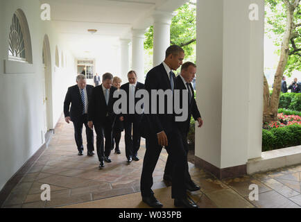 President Barack Obama (L) talks with Denmark Prime Minister Lars Lokke Rasmussen as they and other Nordic leaders walk along the White House Colonnade to the Oval Office during the State Visit in Washington, DC, on May 13, 2016. Other Nordic leaders are second row Finland President Sauli Niinisto and Sweden Prime Minister Stefan Lofven (R), third row Iceland Prime Minister Sigurdur Ingi Johannsson and Norway Prime Minister Erna Solberg (R). Photo by Pat Benic/UPI Stock Photo