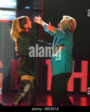 Latin artist Jennifer Lopez is seen introducing presidential candidate Hillary Clinton before her GOTV performance at a rally at Bayfront Park Amphitheater, in Miami on October 29, 2016. Photo by Gary I Rothstein/UPI Stock Photo