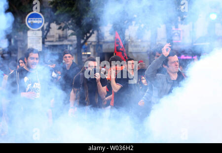 Protesters face security forces as violence erupted during a demonstration against the government's proposed labor a law in Paris, on 26 May 2016. According to unions, some 300,000 protested countywide. Photo by Maya Vidon-White/UPI Stock Photo