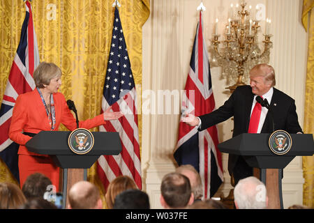 U.S. President Donald Trump and United Kingdom Prime Minister Theresa May discuss issues during a joint press conference in the East Room of the White House in Washington D.C. on January 27, 2017. Photo by Pat Benic/UPI Stock Photo