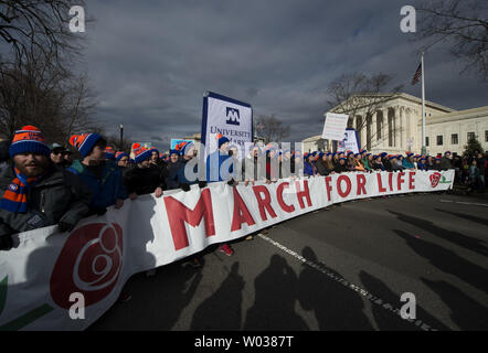 Participants carry a sign during March for Life outside the U.S. Supreme Court in Washington, D.C., on January 27, 2017. Activists from across the nation participated in the annual pro-life rally protesting abortion and the 1973 Roe v. Wade Supreme Court decision legalizing abortion. Photo by Molly Riley/UPI Stock Photo