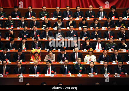Chinese delegates attend the closing ceremony of the 19th National Congress of the Communist Party of China in the Great Hall of the People in Beijing on October 24, 2017. The Congress is held every five years and is considered the most important political meeting in China, where new leaders are chosen and new policies are discussed and implemented. Photo by Stephen Shaver/UPI Stock Photo