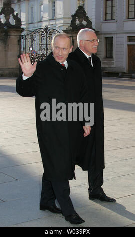 Russian President Vladimir Putin (L) and Czech President Vaclav Klaus leave after their meeting in Prague, March 2, 2006. Putin is on a two-day state visit to Czech Republic. (UPI Photo/Anatoli Zhdanov) Stock Photo