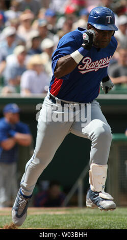 Texas Rangers Sammy Sosa tries to run out a ground ball during Cactus League action between the Rangers ad the Chicago Cubs at HoHoKam Park in Mesa, Arizona March 21, 2007. (UPI Photo/Art Foxall) Stock Photo