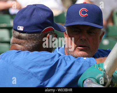 Chicago Cubs great Billy Williams (left) looks over at new Manager