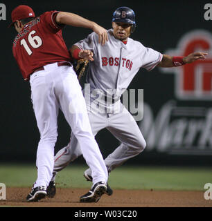 Boston Red Sox's Coco Crisp beats out an infield single as the