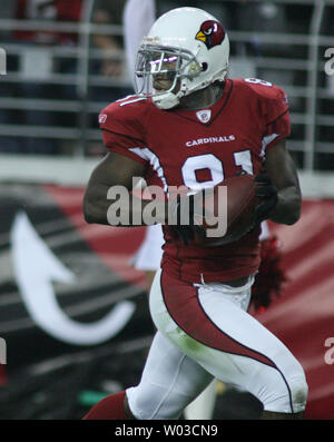 Arizona Cardinals' wide receiver Anquan Boldin goes up to catch a