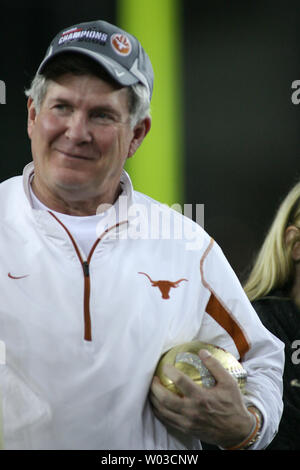 Texas head coach Mack Brown holds the Fiesta Bowl Trophy after Texas defeated Ohio State 24-21 in the Fiesta Bowl at University of Phoenix Stadium in Glendale, Arizona, January 5, 2009. (UPI Photo/Art Foxall) Stock Photo