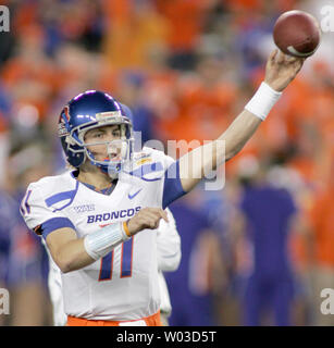 Boise State quarterback Kellen Moore #11 during the NCAA football game  between the Boise State University Broncos and the Texas Christian  University Horned Frogs at the University of Phoenix Stadium in Glendale