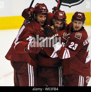 Phoenix Coyotes Taylor Pyatt (L), Antoine Vermette (C) and Oliver Ekman-Larsson celebrate a goal against the Nashville Predators in the second period of game two  of the second round of the NHL Stanley Cup Playoffs at Jobing.Com Arena in Glendale, Arizona, April 29, 2012.  UPI/Art Foxall Stock Photo